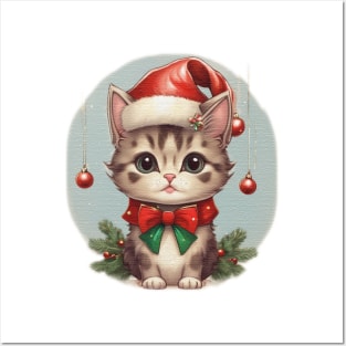 cute little kitten wearing a santa hat Posters and Art